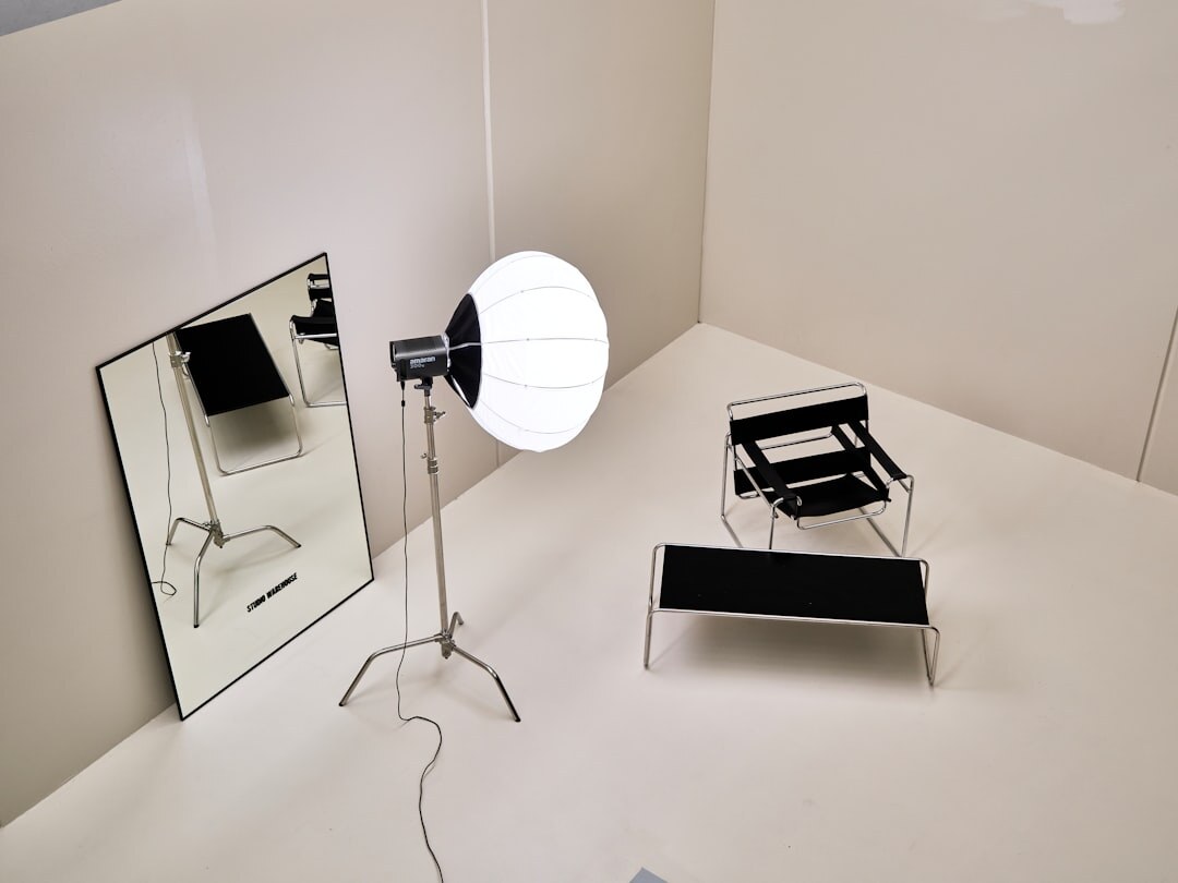 Studio softbox lighting setup pointed at an empty chair
